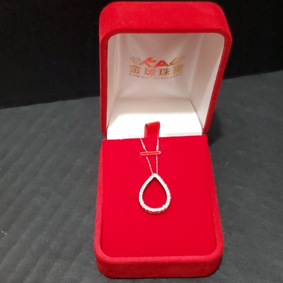 White 14 k Necklace with diamonds.